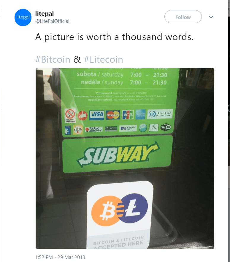 Биткойн и Litecoin лого в метрото